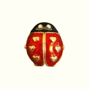 Avon lady bug pin, 1.75". Gold tone pin with red and black enamel